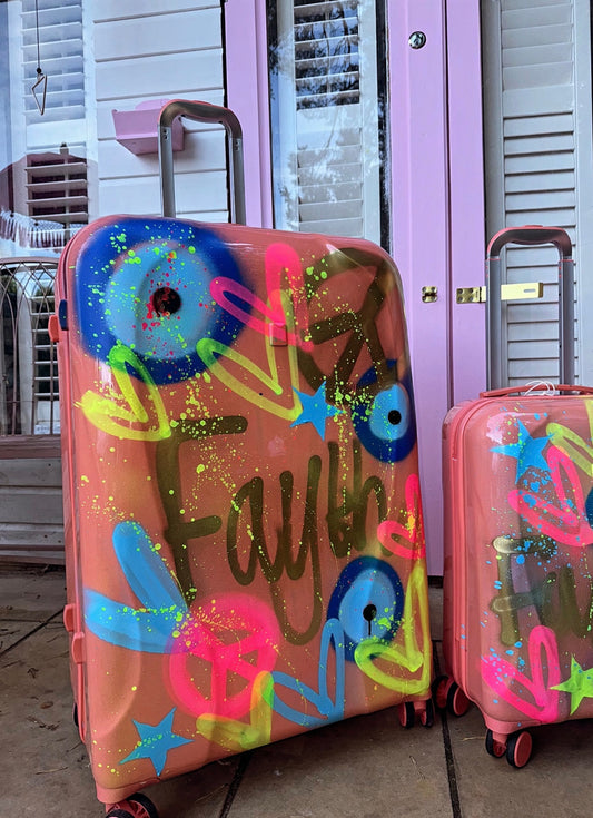 Hand luggage orange spray painted Suitcase ๐งก