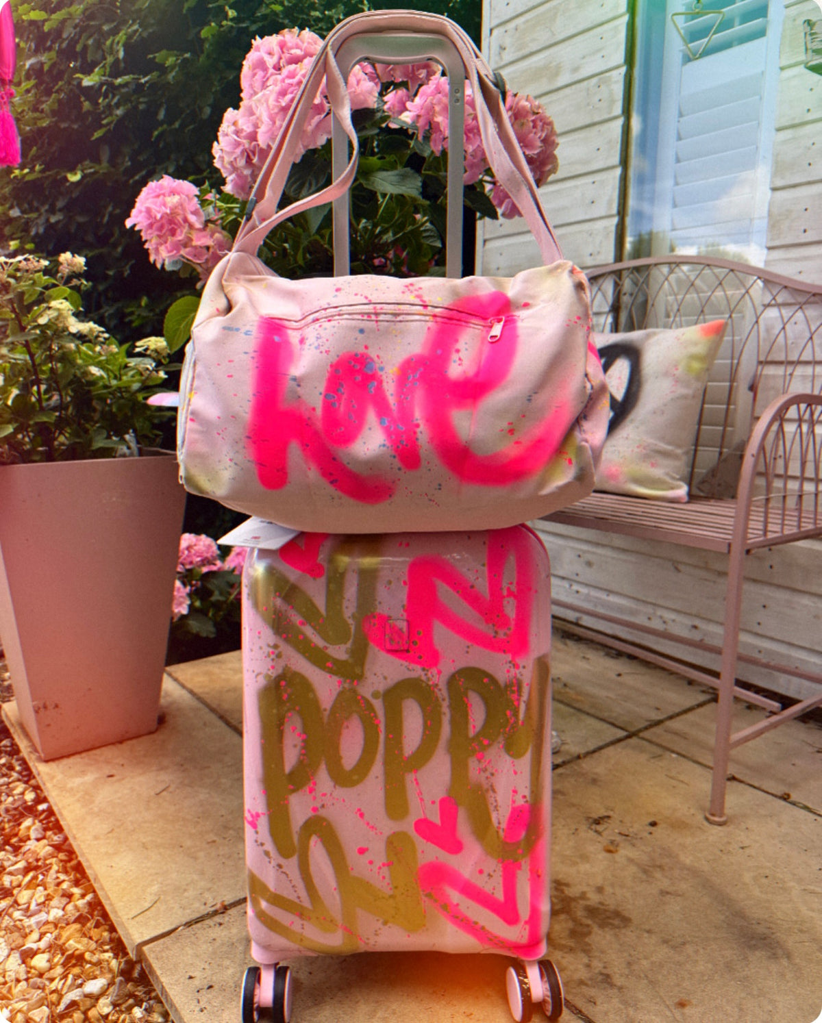 Spray painted travel holdalls π