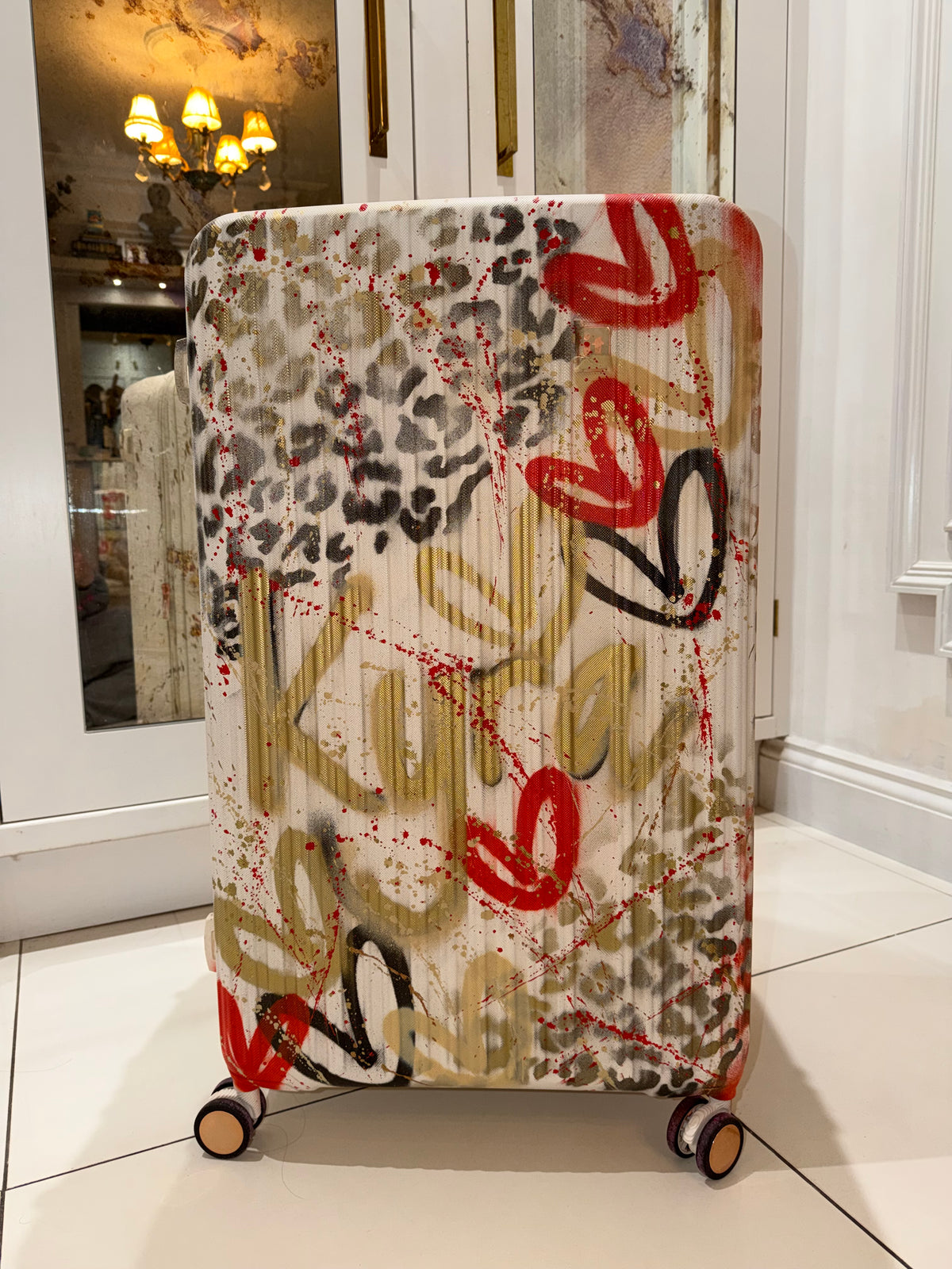 Medium spray painted suitcase 🐆✨