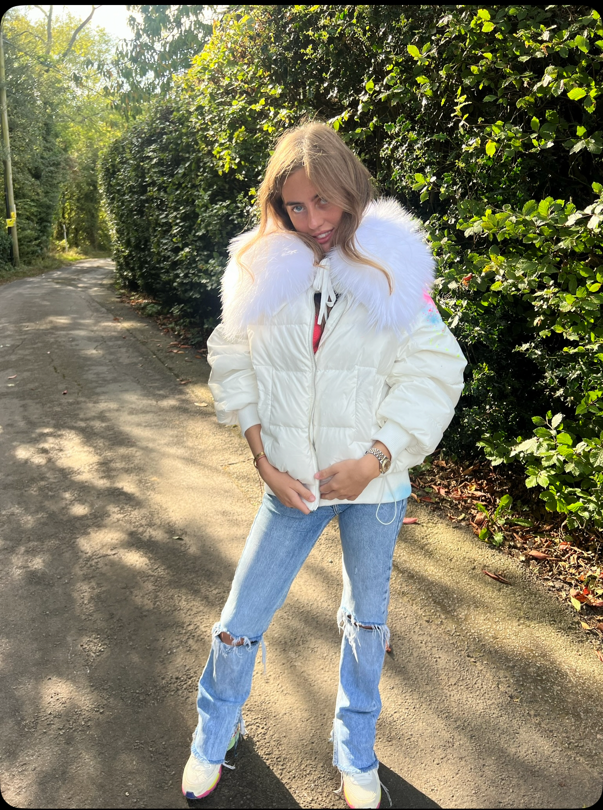 Spray painted puffer coat with real fur 🤍
