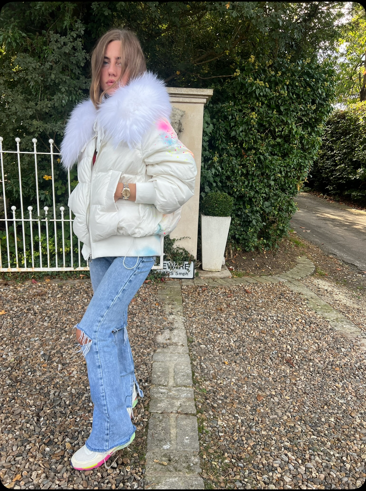 Spray painted puffer coat with real fur 🤍