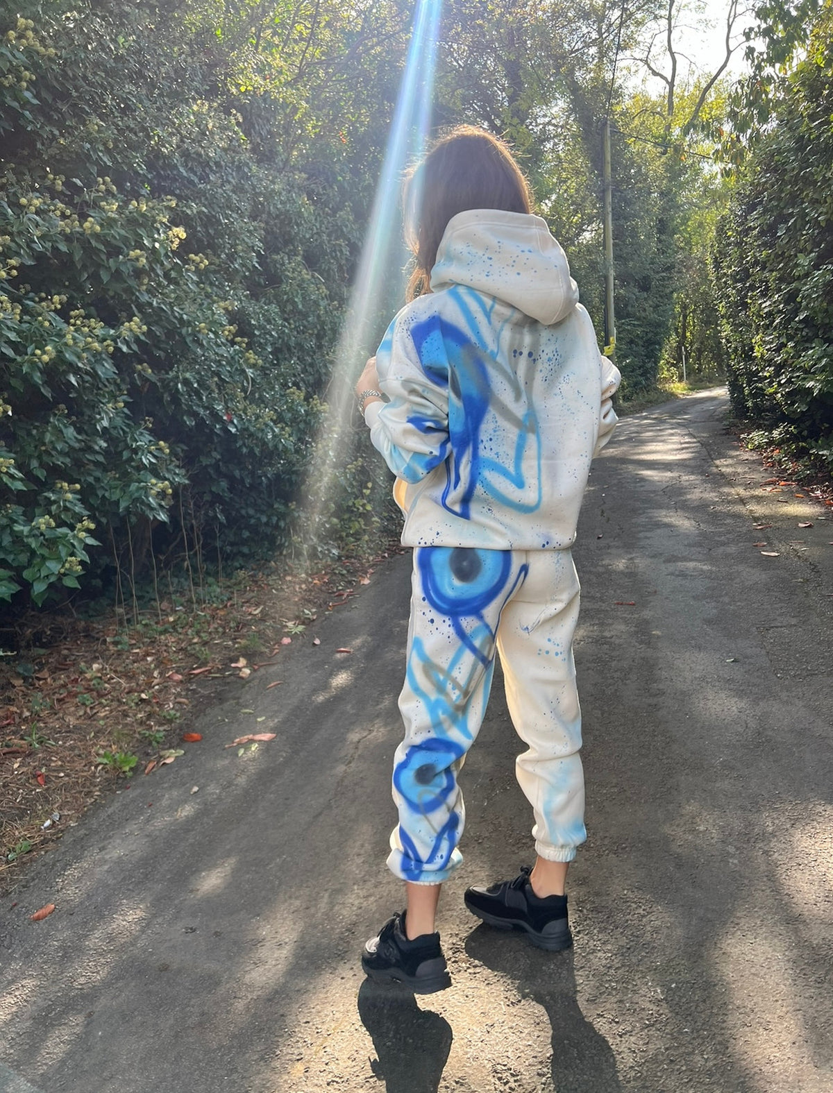 Spray painted evil eye tracksuits 🌍💙😍🫶🏻