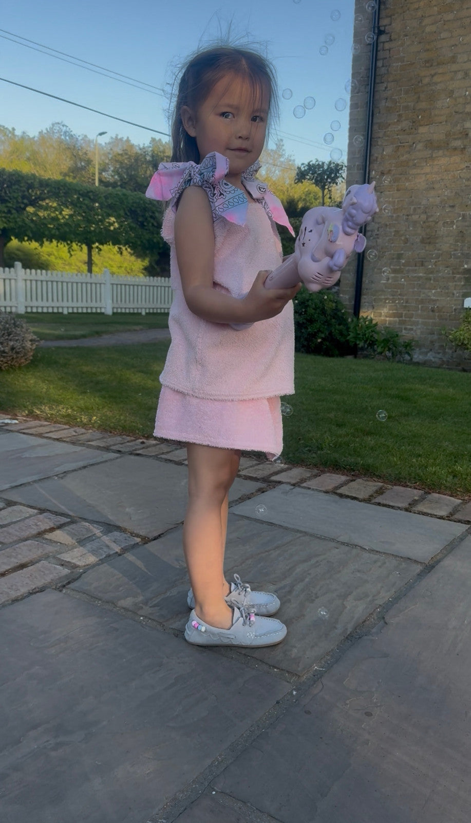 Baby pink children’s towelling skirt set with bandana ties 💘