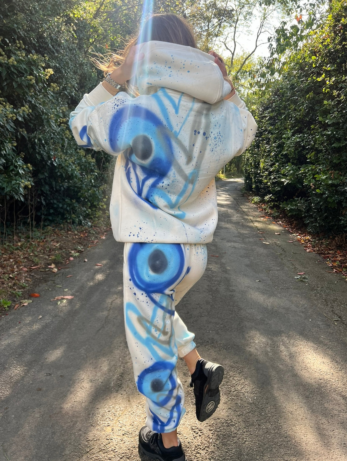 Spray painted evil eye tracksuits 🌍💙😍🫶🏻