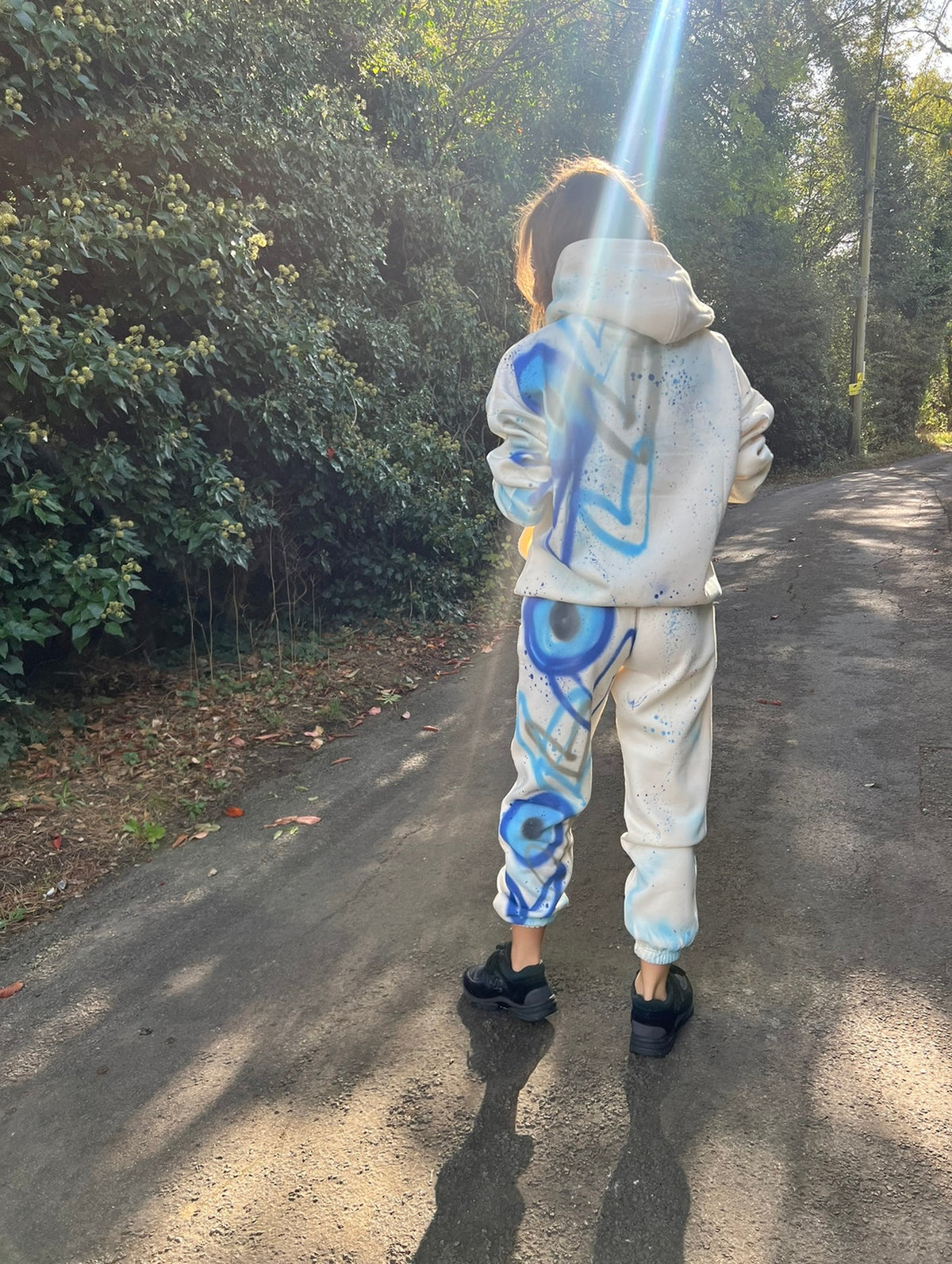 Spray painted evil eye tracksuits 🌍💙😍🫶🏻