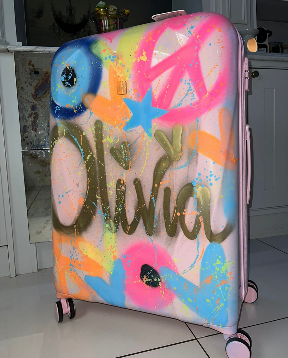 Large pink spray painted  suitcases 💗😍